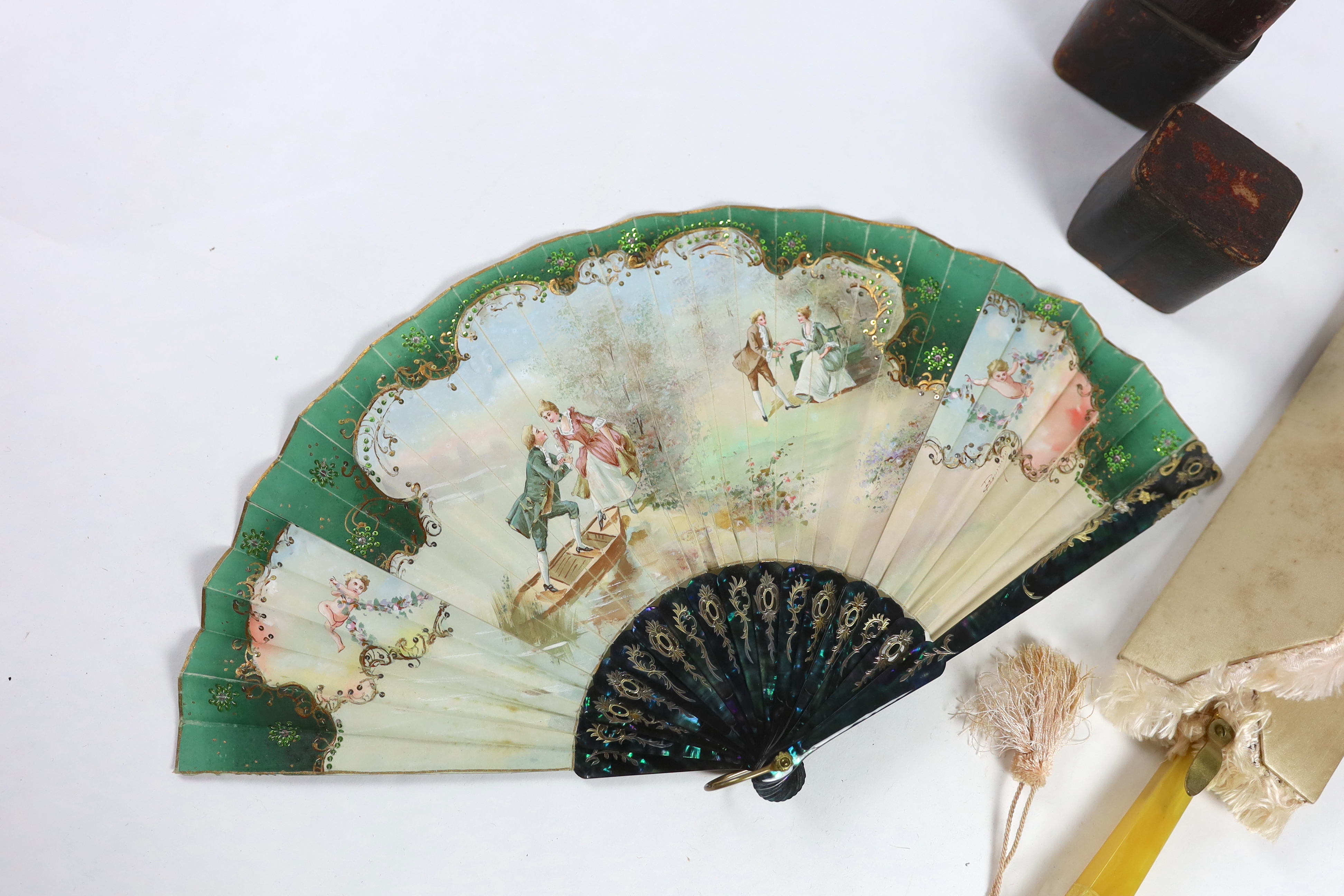 Six Edwardian novelty and unusual fans, some possibly bought during a Grand Tour.